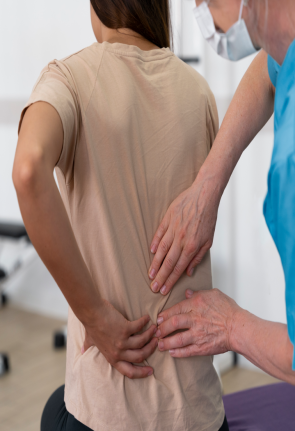 medical-assistant-helping-patient-with-physiotherapy-exercises - Copy